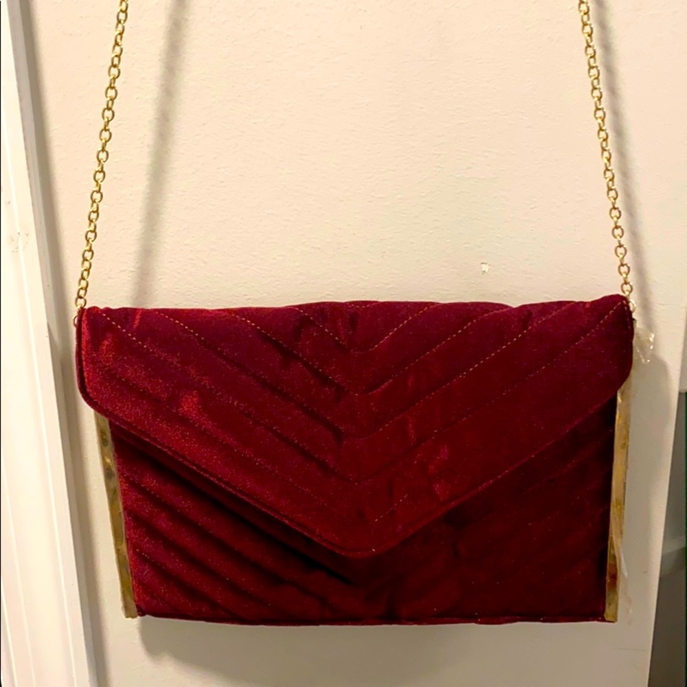 Red velvet clutch bag